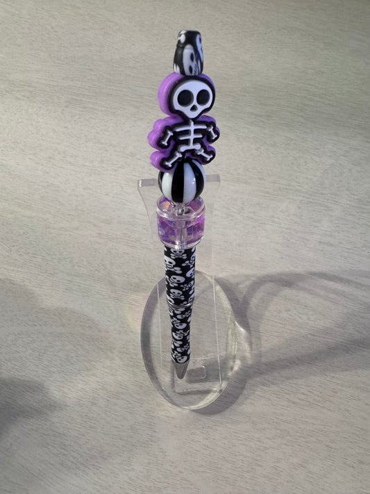 Purple skeleton with water bead