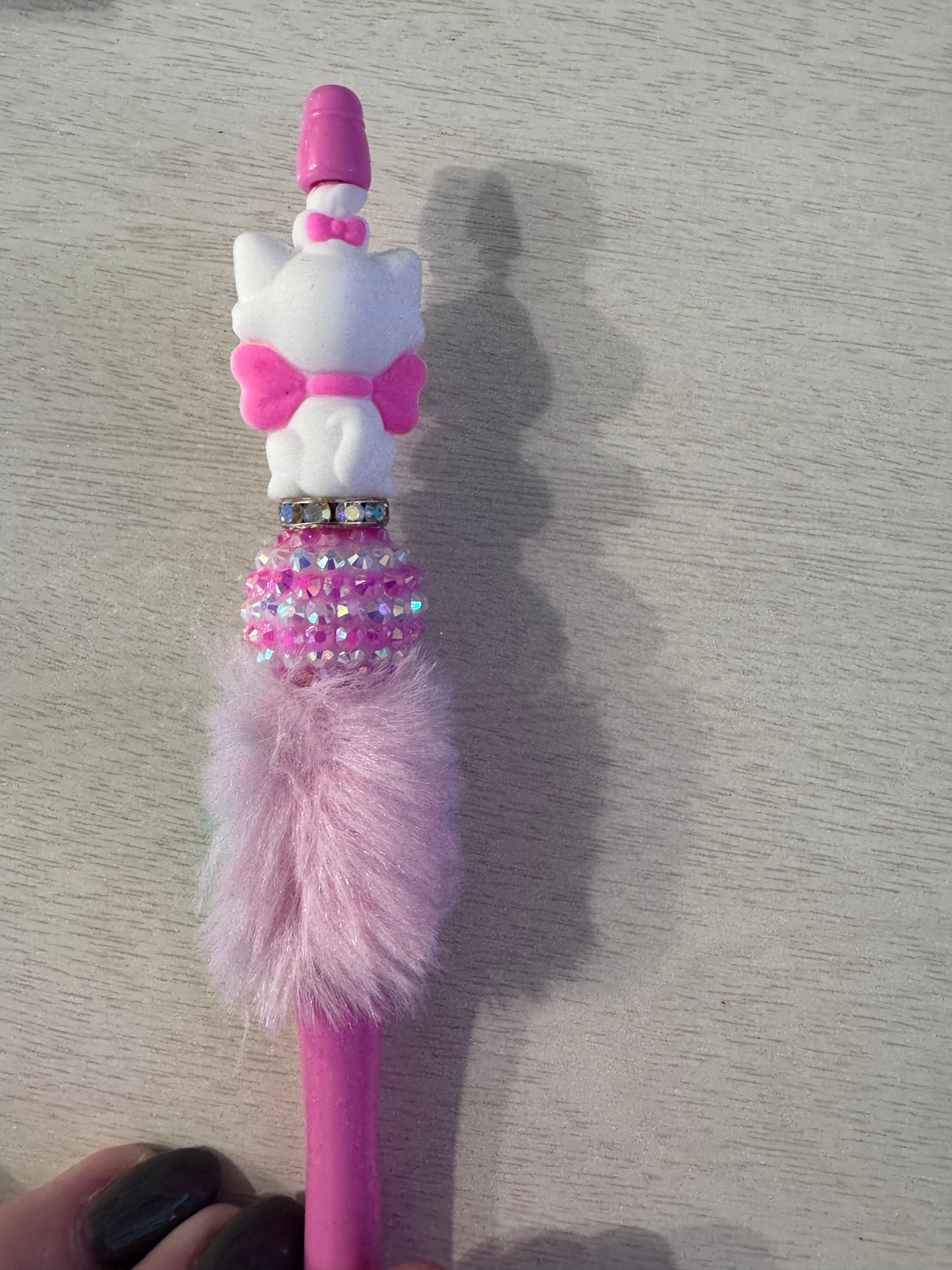Kitty with pink bow and fluffy two colored pen