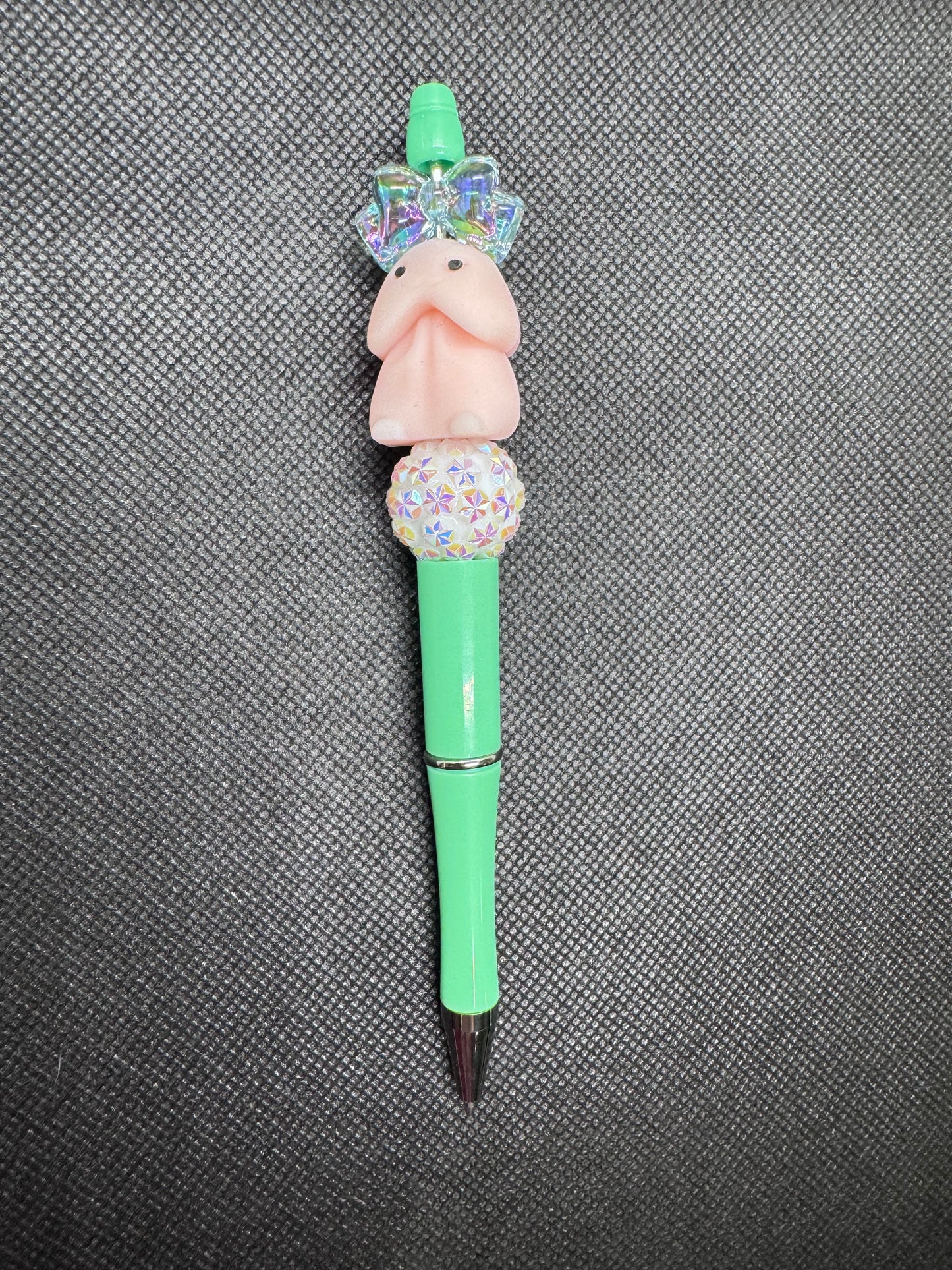 Pink Richard “peen” with blue/teal bow