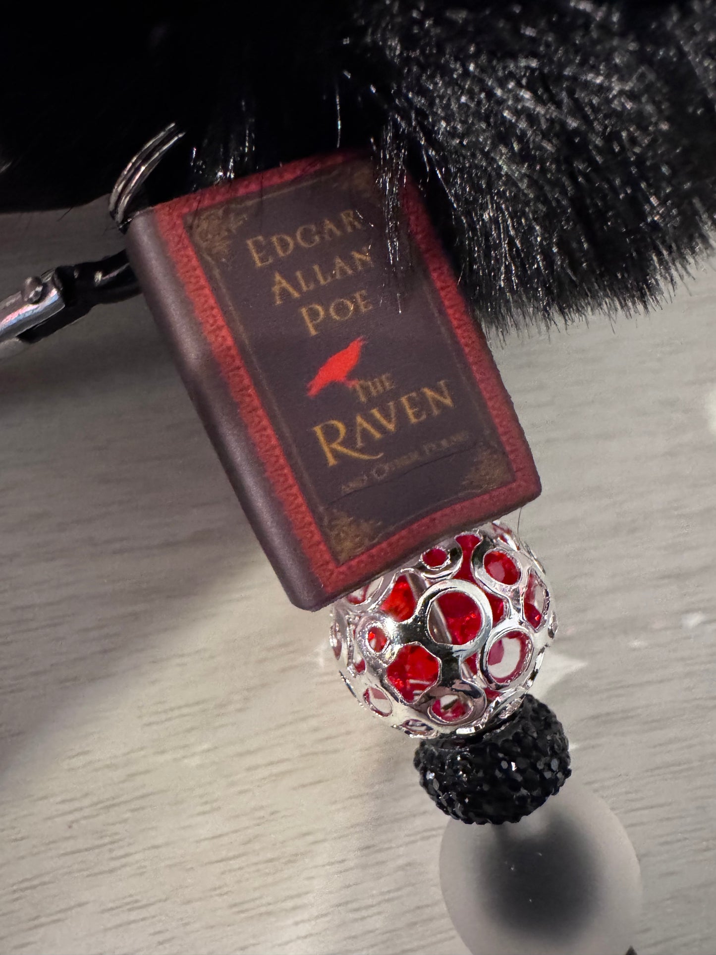 Poe the Raven book keychain
