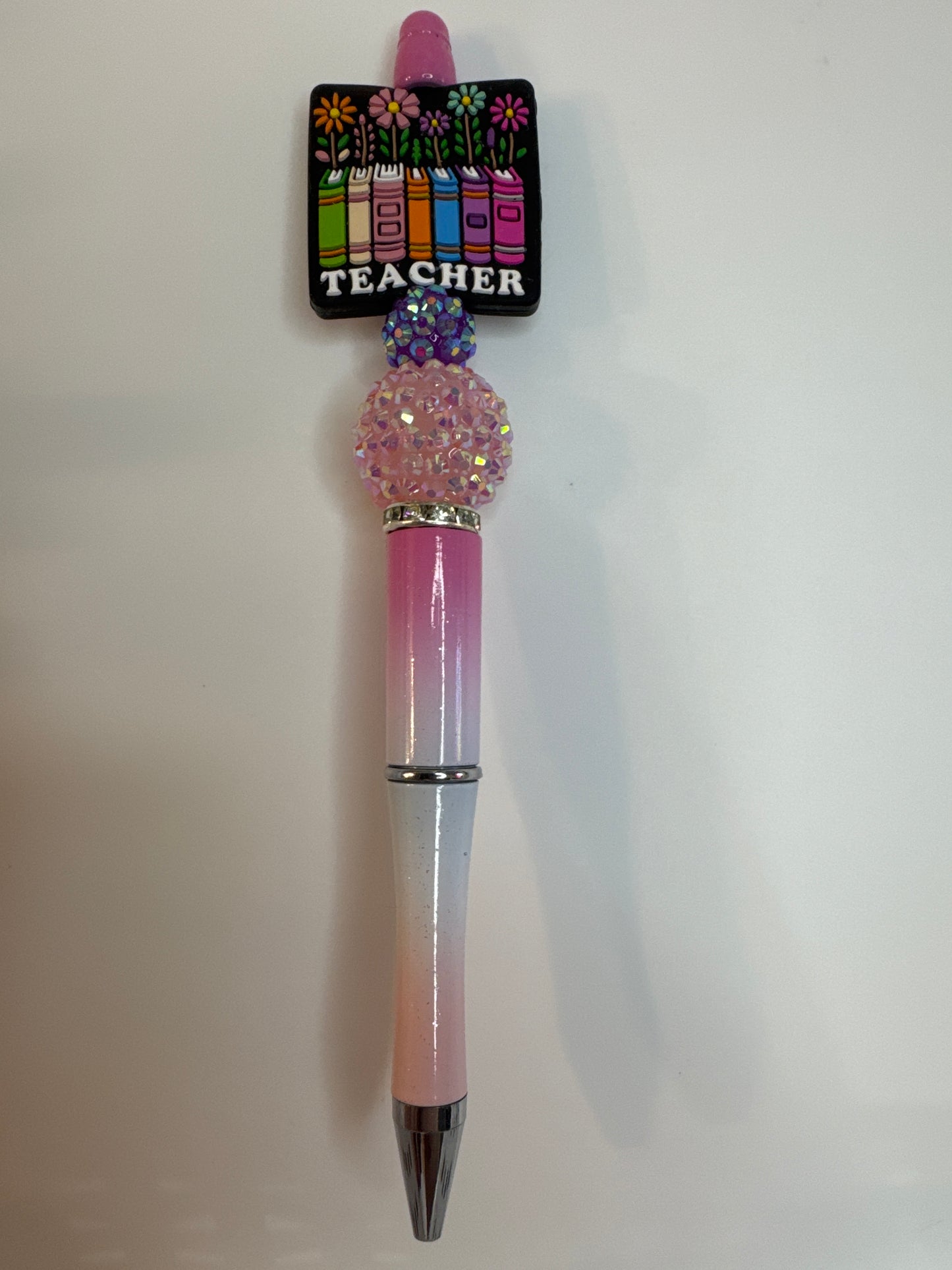 Teacher books with flowers