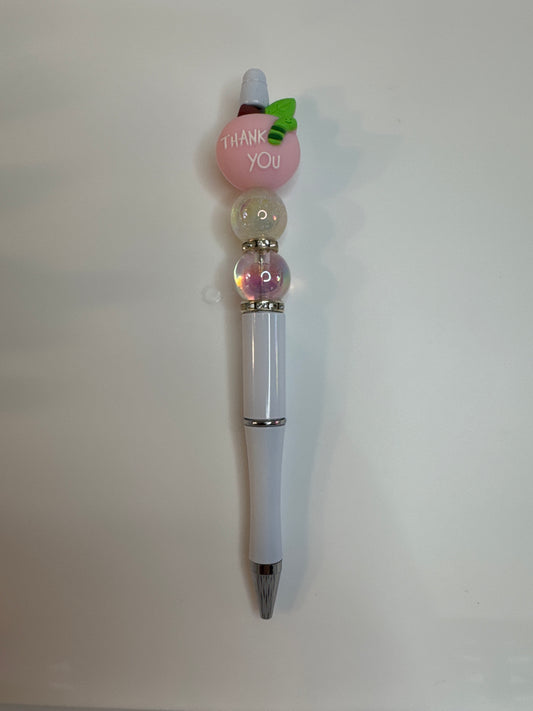 Pink teacher apple with thank you on reverse side