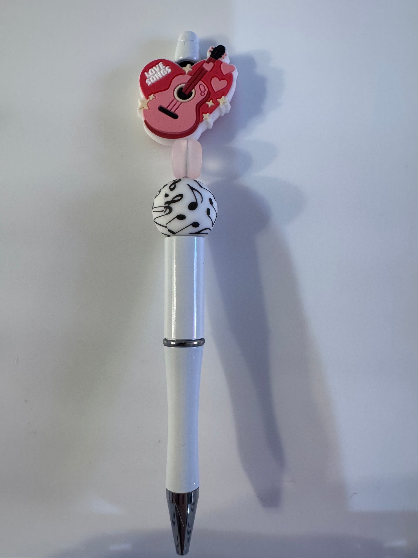 Love songs guitar with music note bead