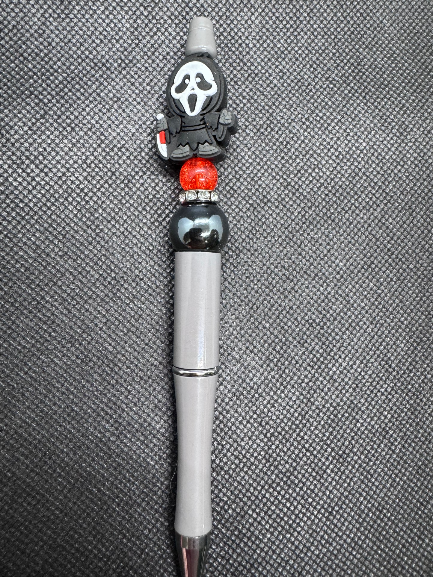 Scream ghost face masked man