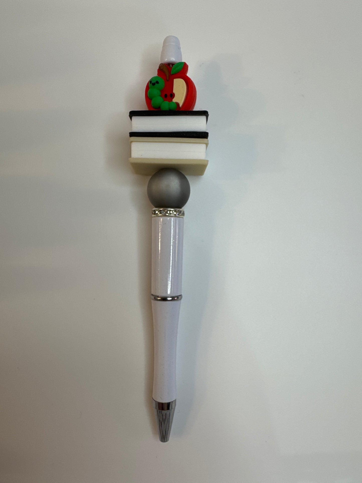 Bookworm apple with books