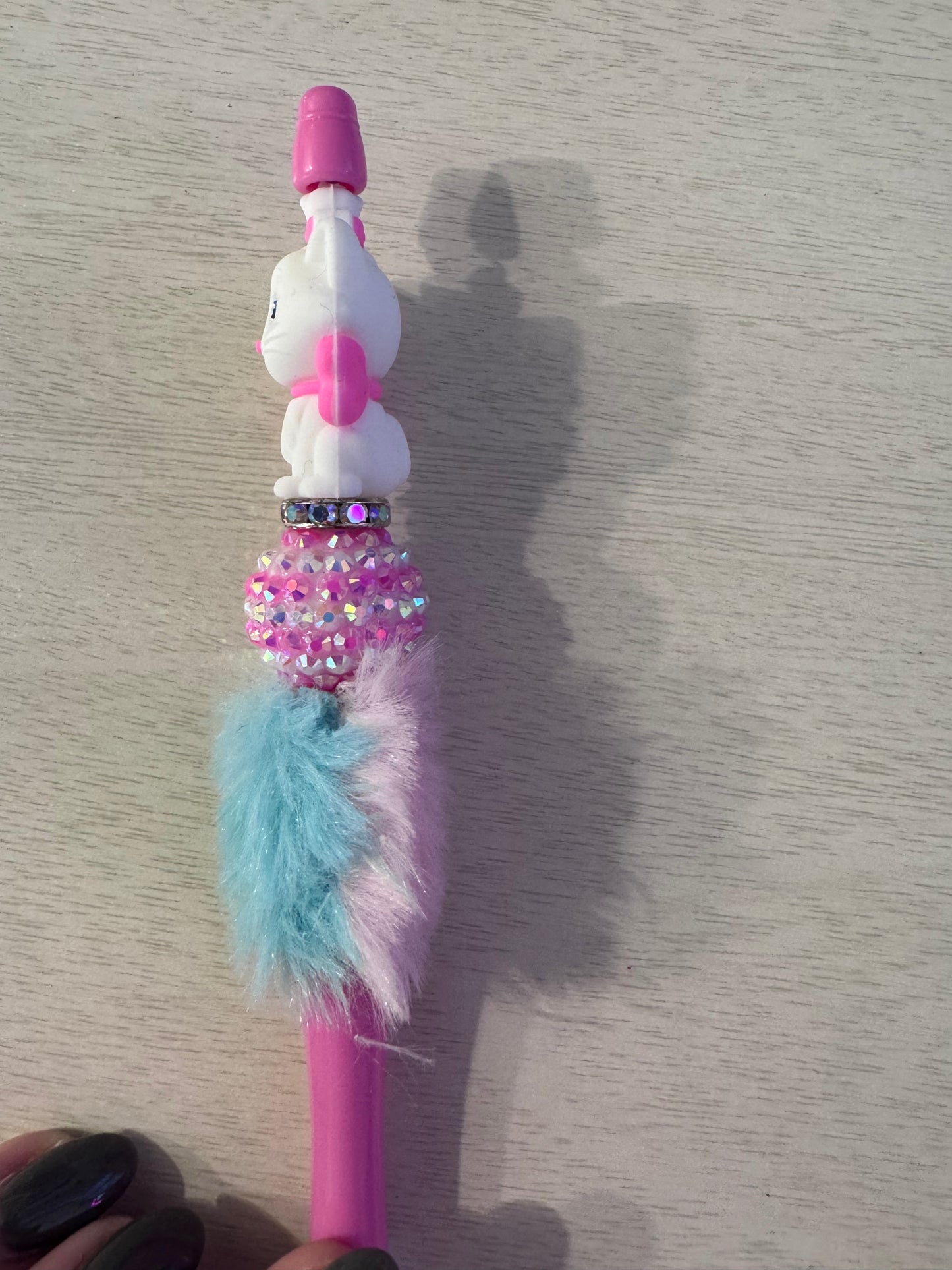 Kitty with pink bow and fluffy two colored pen