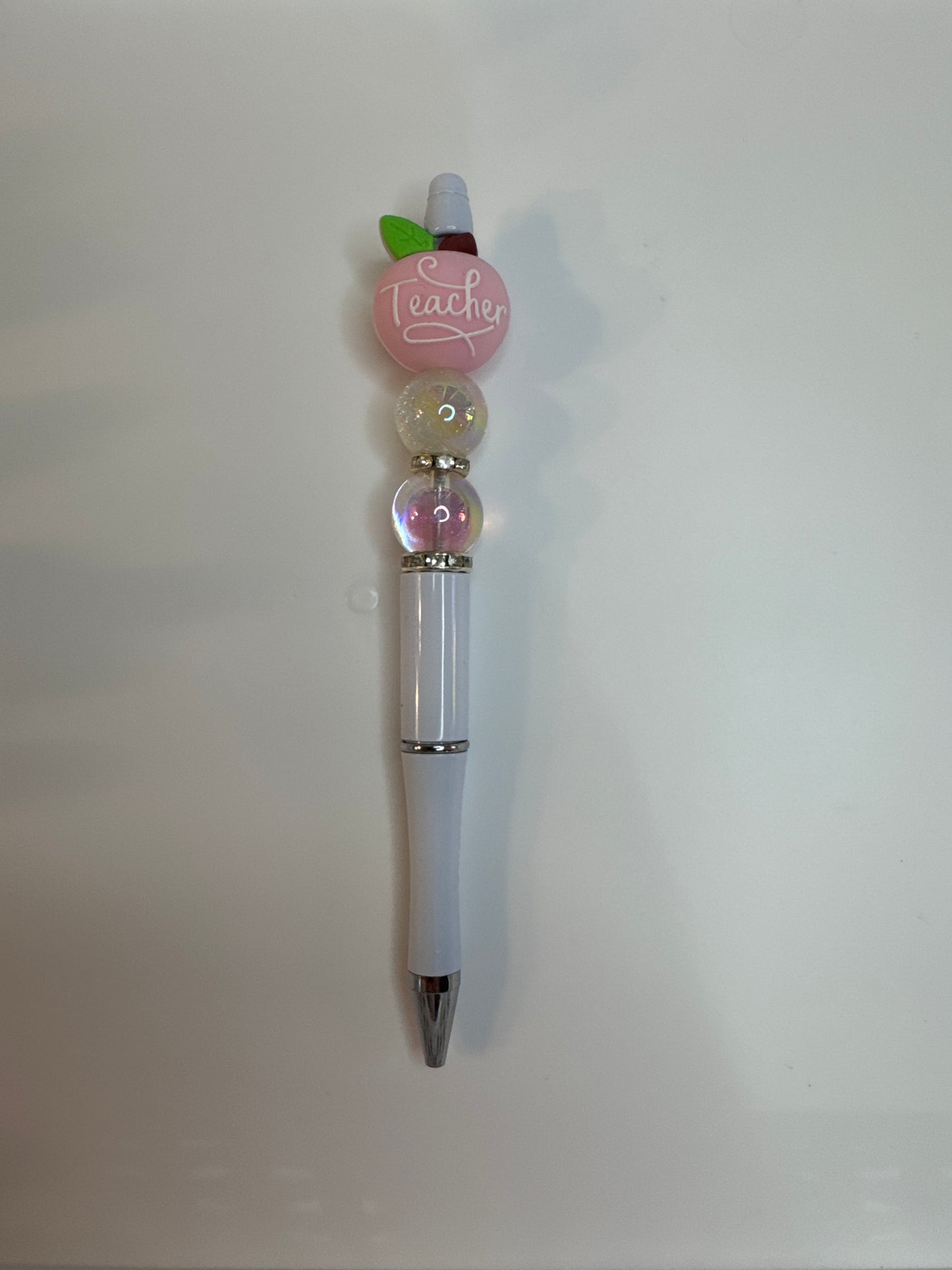 Pink teacher apple with thank you on reverse side