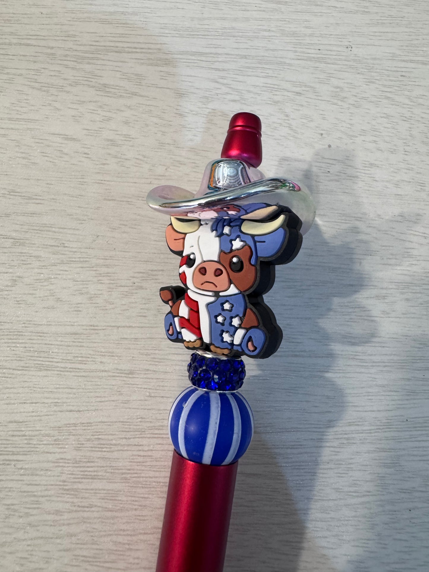 Patriotic cow with disco silver cowboy hat