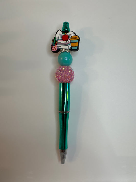 Teachers desk supplies and books