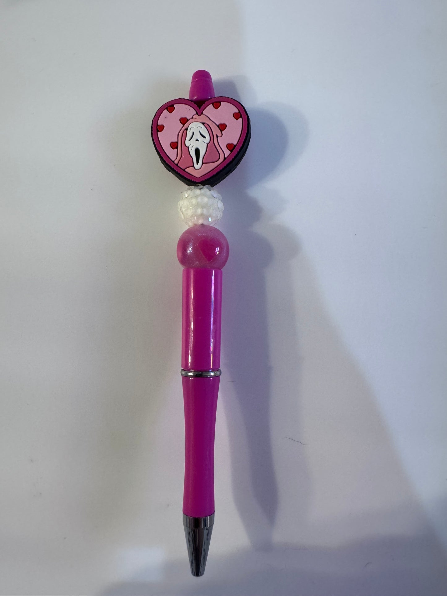 Heart ghost face masked man