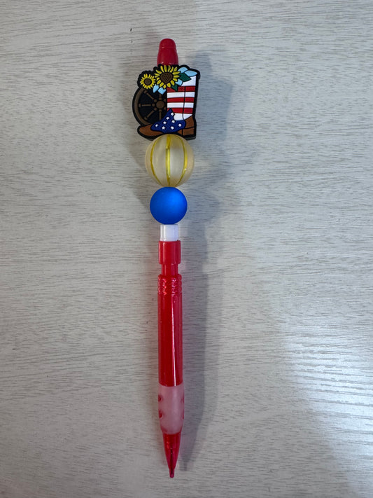 American flag boots, flowers, wagon wheel