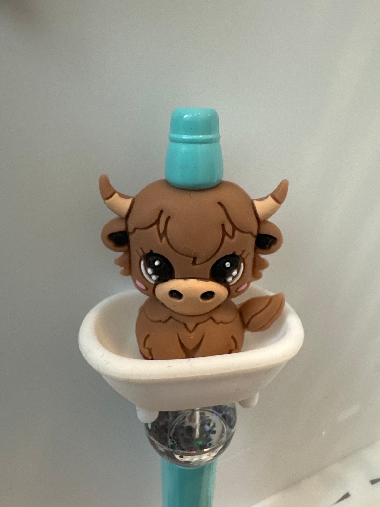Highland cow in tub