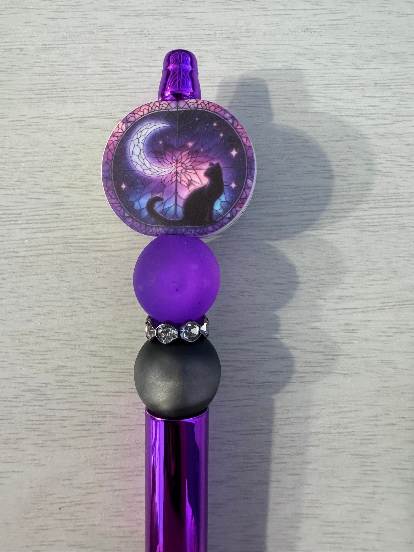 Purple mystic cat with moon