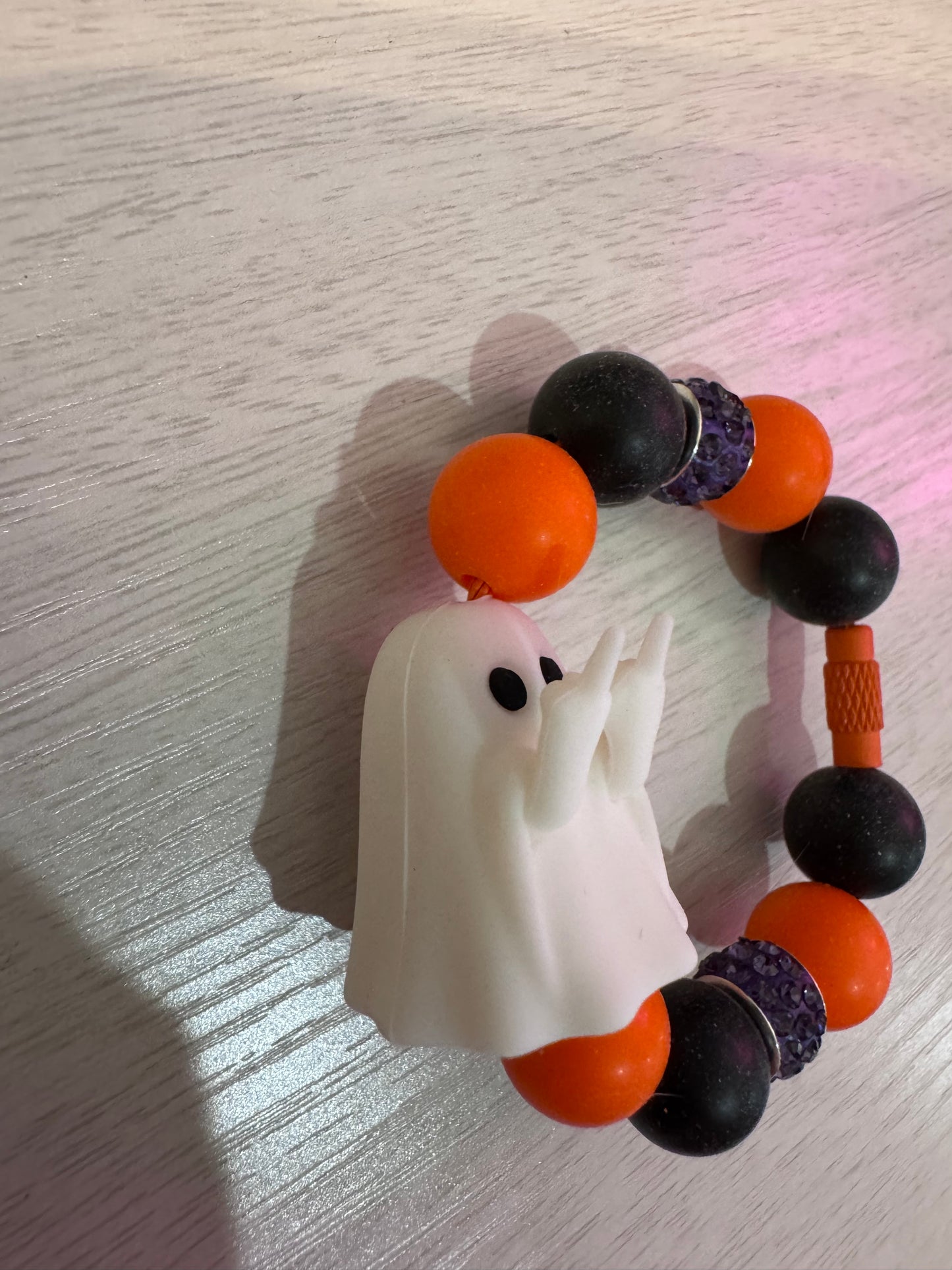 Halloween ghost giving the bird.