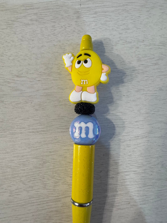 Yellow M&M with special “m” bead