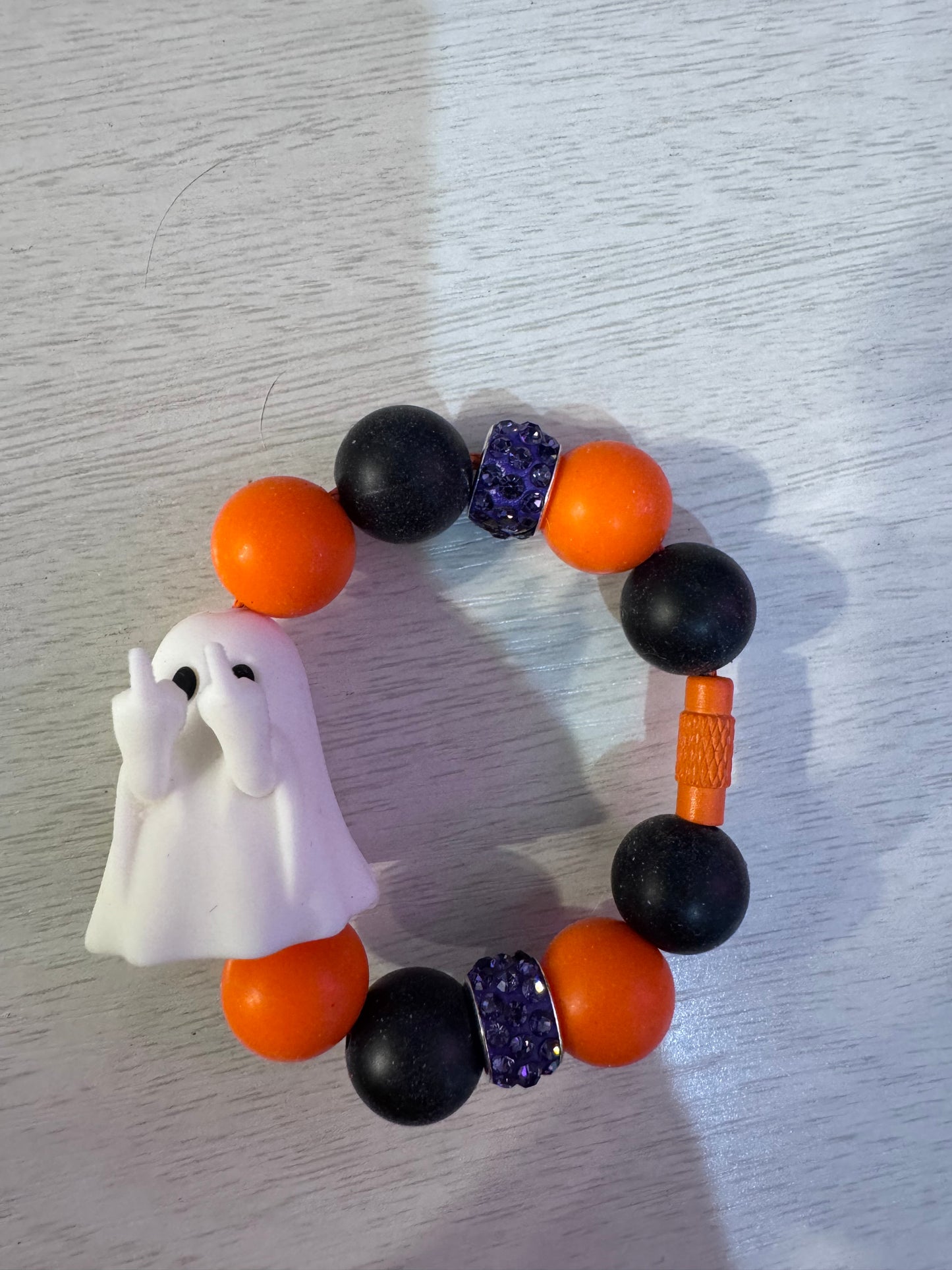 Halloween ghost giving the bird.