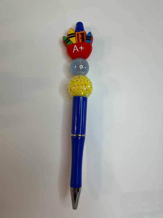 A+ apple filled with teacher supplies